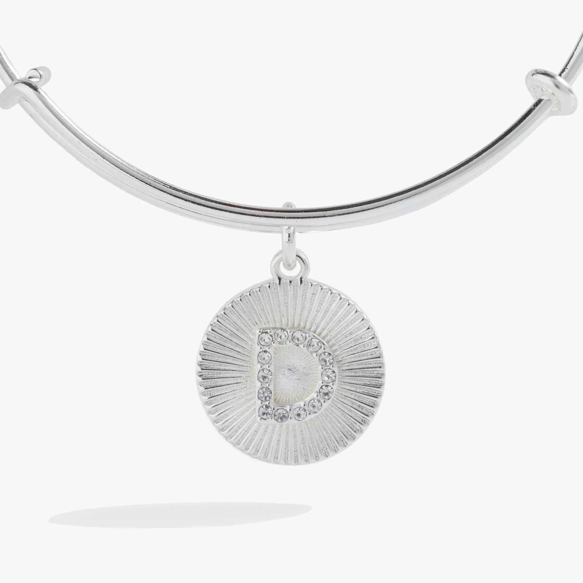 Initial D pave starburst texture bangle, silver Alex and Ani cuff with crystal sunburst pendant on Tampa Home & Garden Store