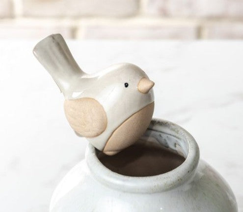 Plant Pot Hanger bird topper by Thenestedfig perched on white ceramic pot with beige accents on Tampa Home & Garden Store
