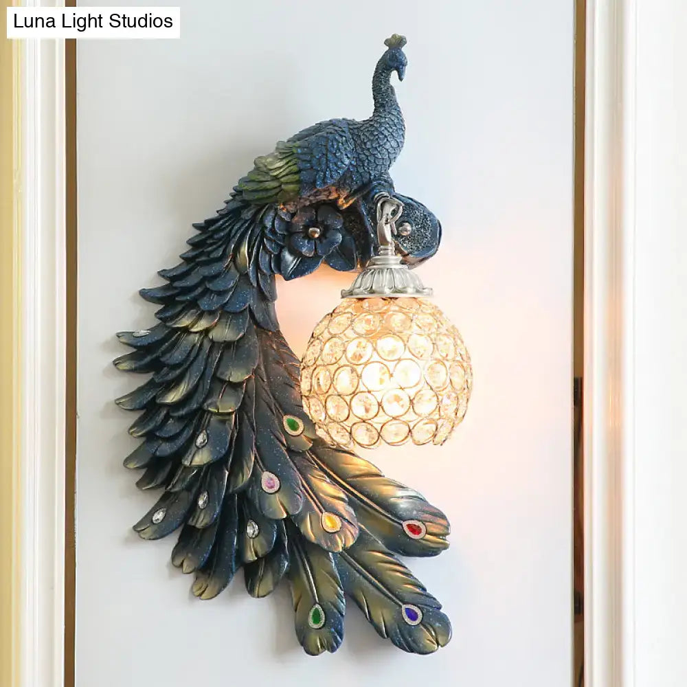 Blue crystal dome peacock wall sconce with resin feathers by Decorbites on Tampa Home & Garden Store