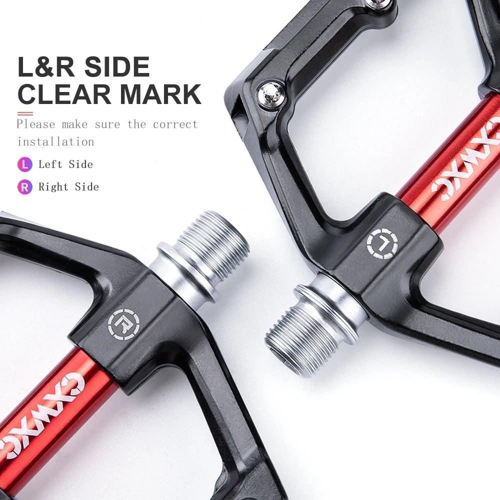 Pair of Stevvex aluminum bicycle pedals with sealed bearings, black bodies and silver spindles on Tampa Home & Garden Store