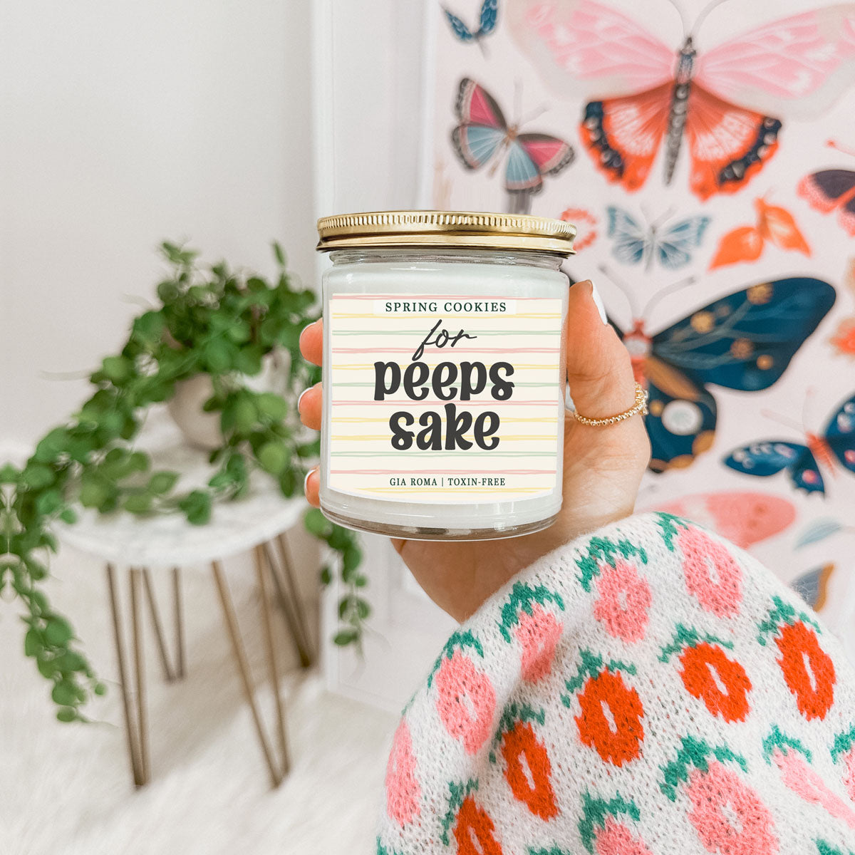 Easter Cookie Candle by Gia Roma in a clear glass jar with a gold lid on Tampa Home & Garden Store