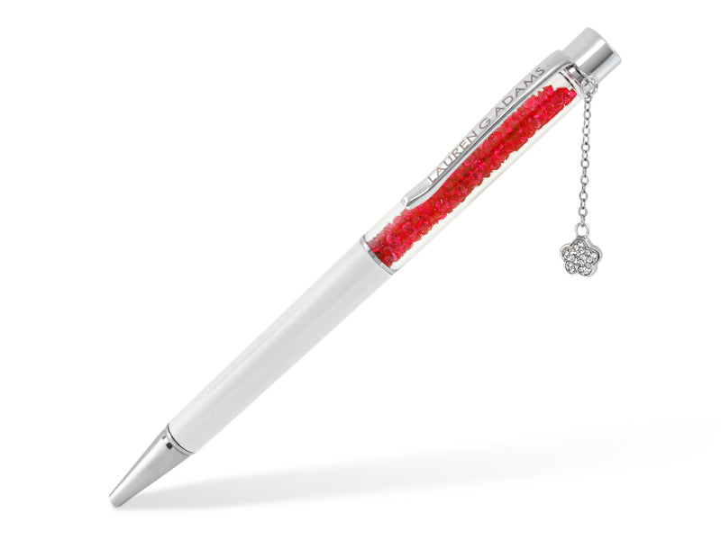 Lauren G Adams pen with red crystal-filled transparent barrel, silver body and branded clip on Tampa Home & Garden Store
