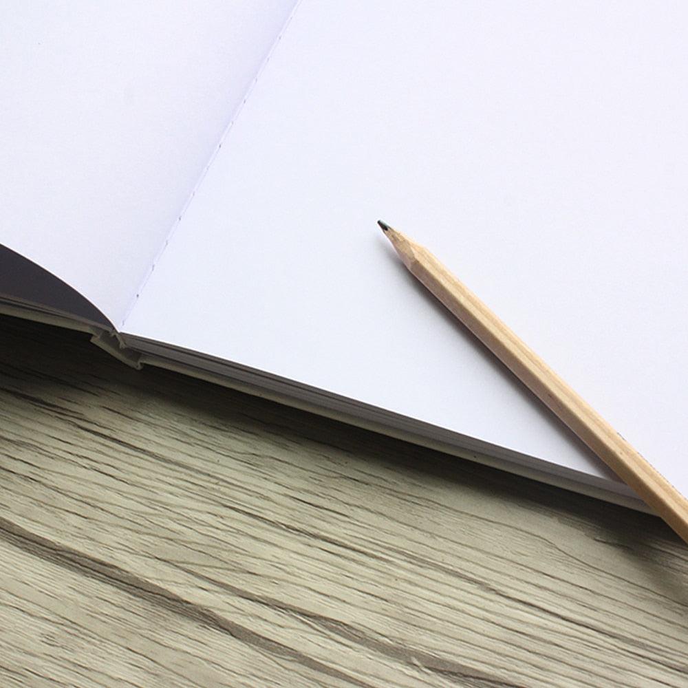 Personalized Wood Look Printable White Guestbook open with blank pages and pencil on wood desk on Tampa Home & Garden Store