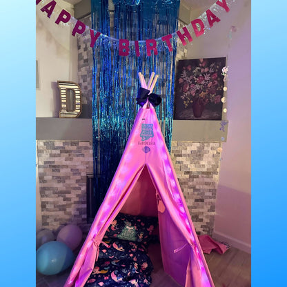 Pink mermaid teepee with pillow bed and fairy lights, tinsel backdrop on Tampa Home & Garden Store