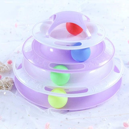 Interactive cat toy Stevvex with purple tiered track maze and colorful balls on Tampa Home & Garden Store