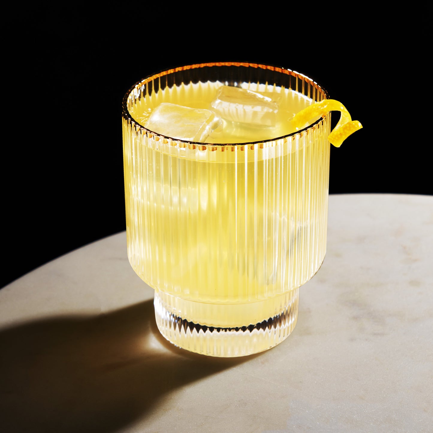 A Set of Two Gold Rimmed Crystal Tumblers