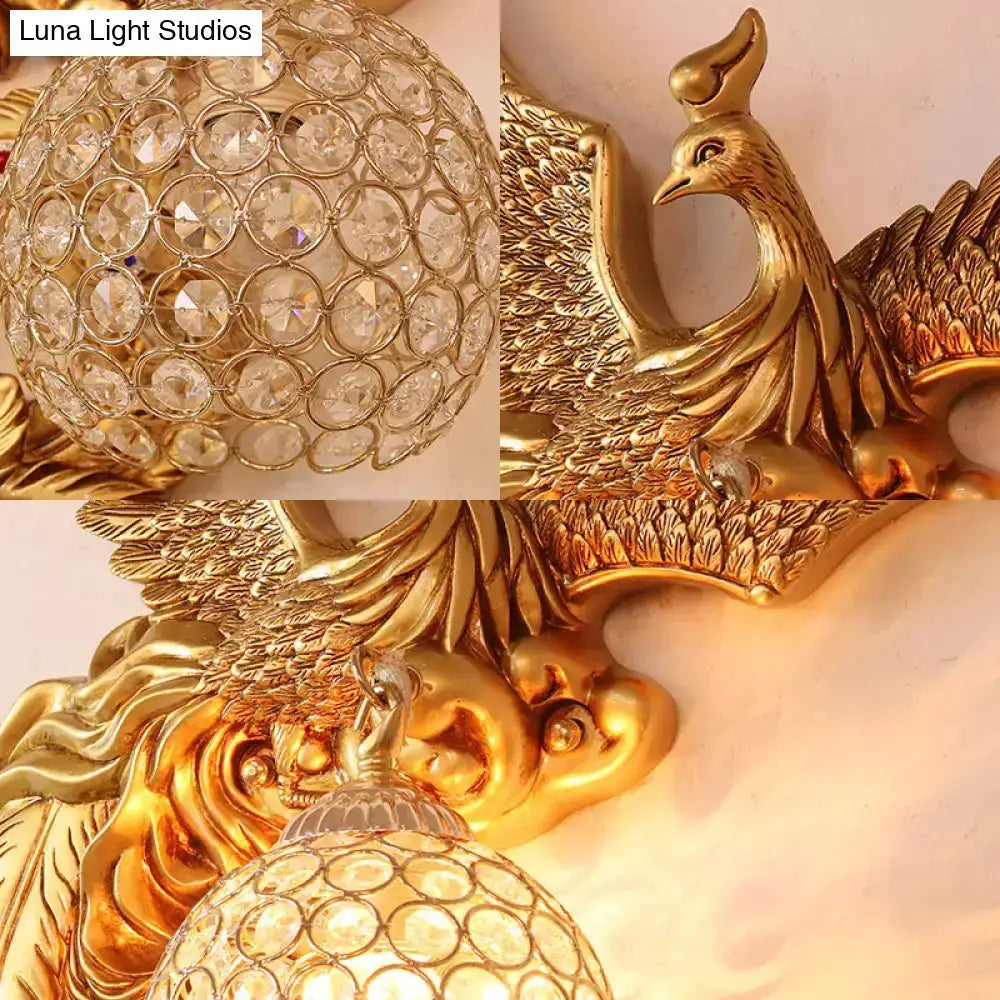 Phoenix gold wall lamp with honeycomb crystal dome and winged bird backplate Decorbites on Tampa Home & Garden Store