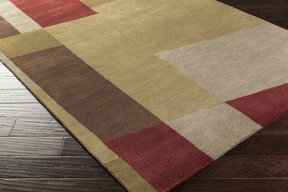 Piedra Premium Wool Area Rug by Boutique Rugs with patchwork in gold beige brown red on Tampa Home & Garden Store
