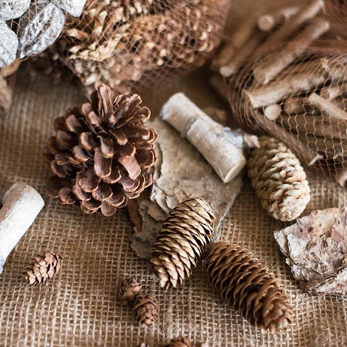 Pine cone decoration by RusticReach featuring natural brown pinecones on burlap on Tampa Home & Garden Store