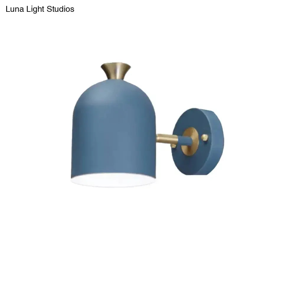 Decorbites macaron wall light sconce in blue with brass accents for dining room decor on Tampa Home & Garden Store