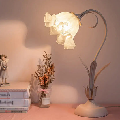 Pink Lily Glass Lamp by Decorbites, pink lily glass shade atop a leaf-inspired base on Tampa Home & Garden Store