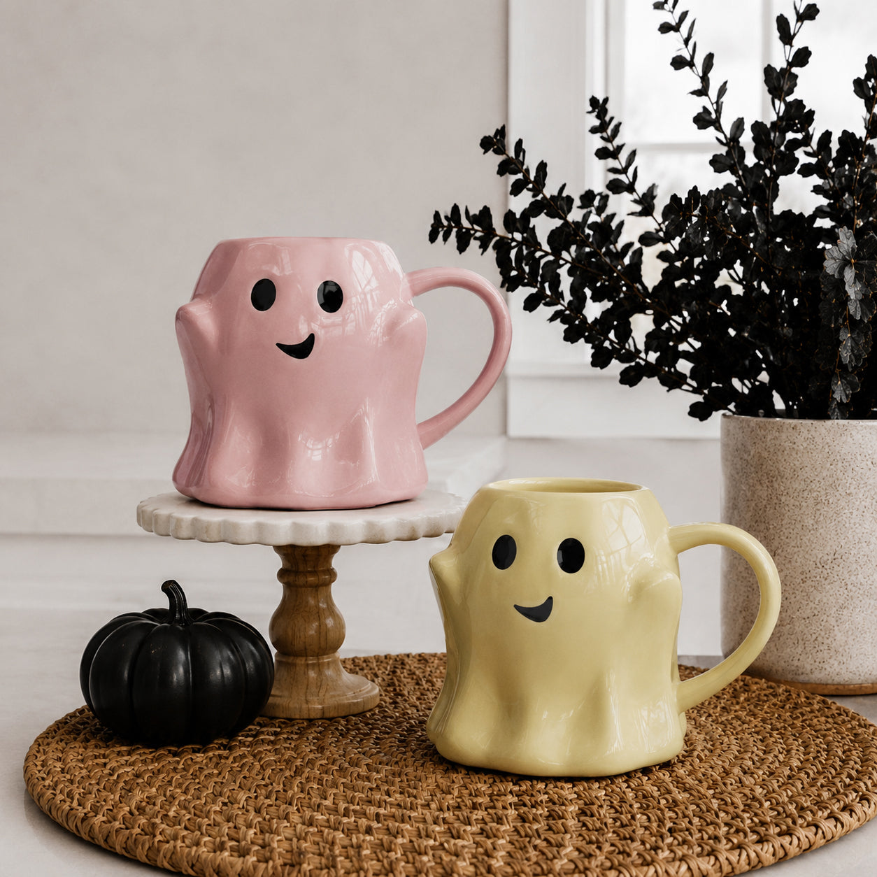 Ghost mug pair: pink and yellow ghost-shaped ceramic coffee mugs with cute faces, Gia Roma on Tampa Home & Garden Store