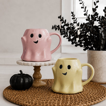 Ghost mug pair: pink and yellow ghost-shaped ceramic coffee mugs with cute faces, Gia Roma on Tampa Home & Garden Store
