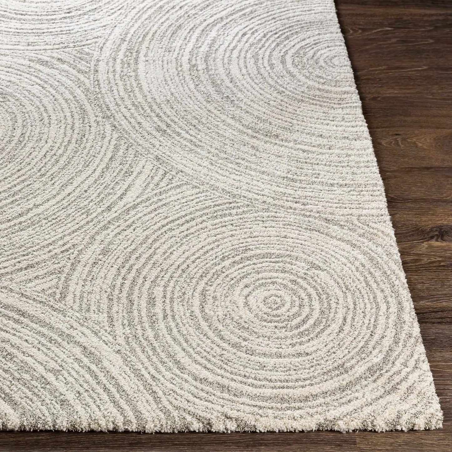 Pirton Luxe Rug beige looped-pile texture on wood floor on Tampa Home & Garden Store
