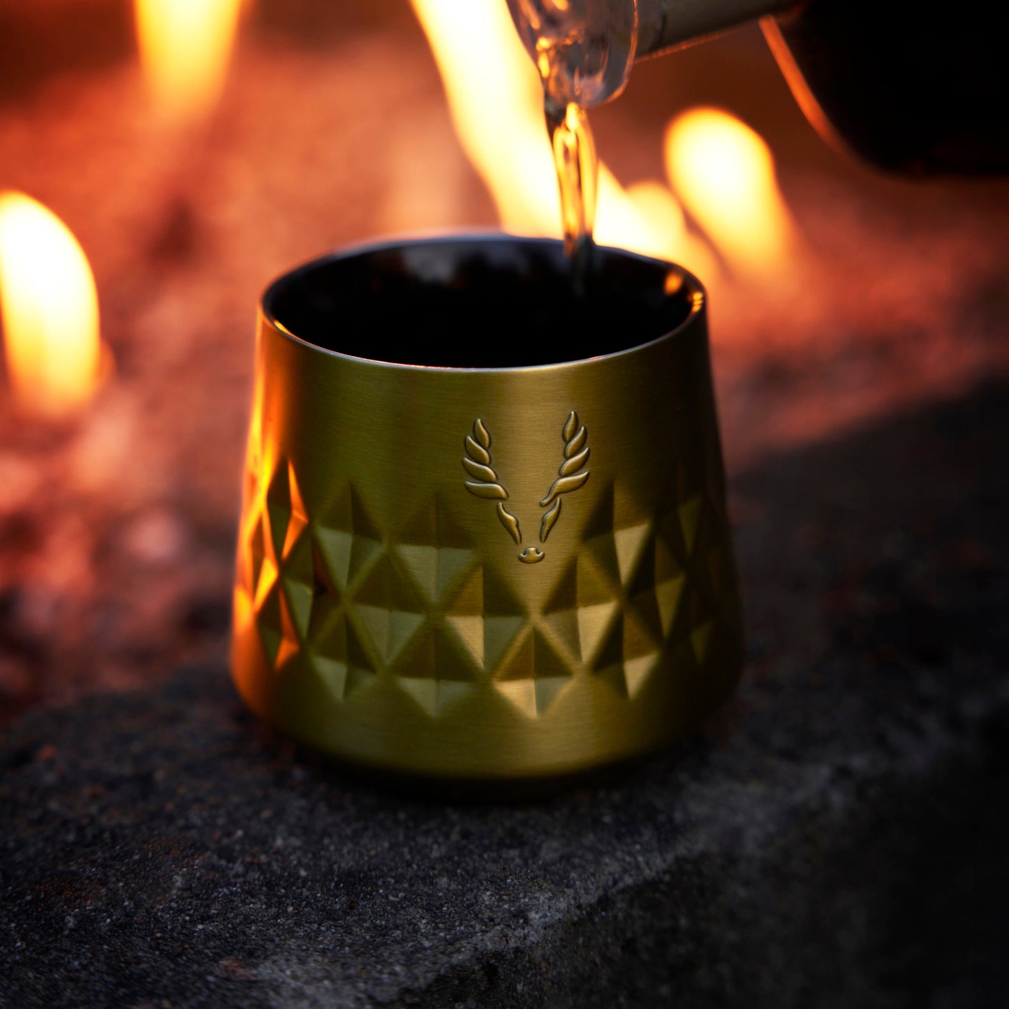 a Paragon Gold and Stainless Whiskey Taster Mug
