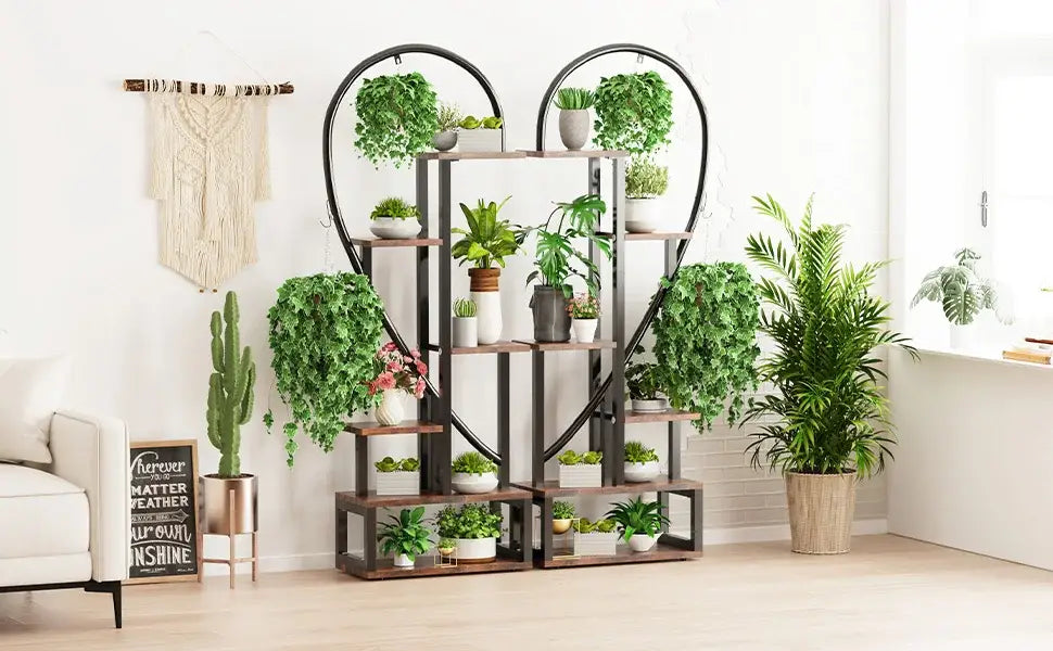 Black Heart Flower Rack with wooden shelves holding potted greenery on Tampa Home & Garden Store
