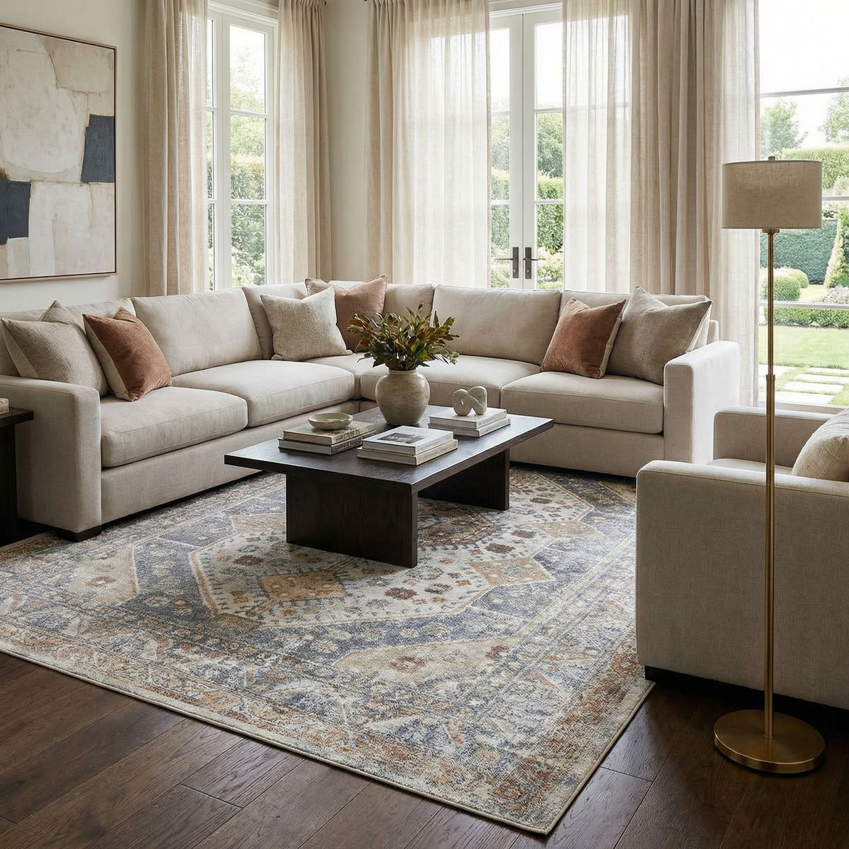 Afya Boutique Washable Rug blue-gray with antique-style pattern under living room sofa on Tampa Home & Garden Store