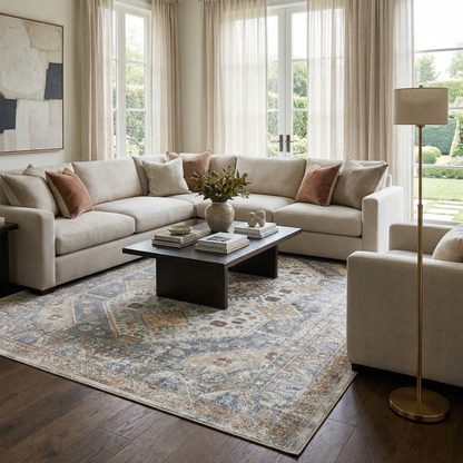 Afya Boutique Washable Rug blue-gray with antique-style pattern under living room sofa on Tampa Home & Garden Store