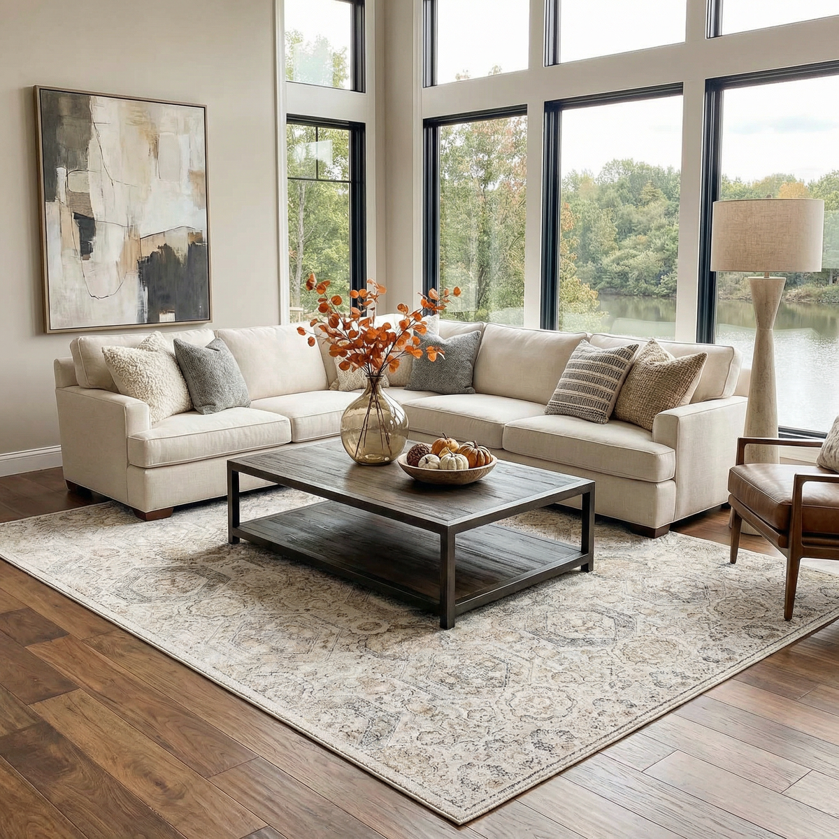 Parkerfield Area Rug in neutral gray-beige with distressed pattern under coffee table on Tampa Home & Garden Store