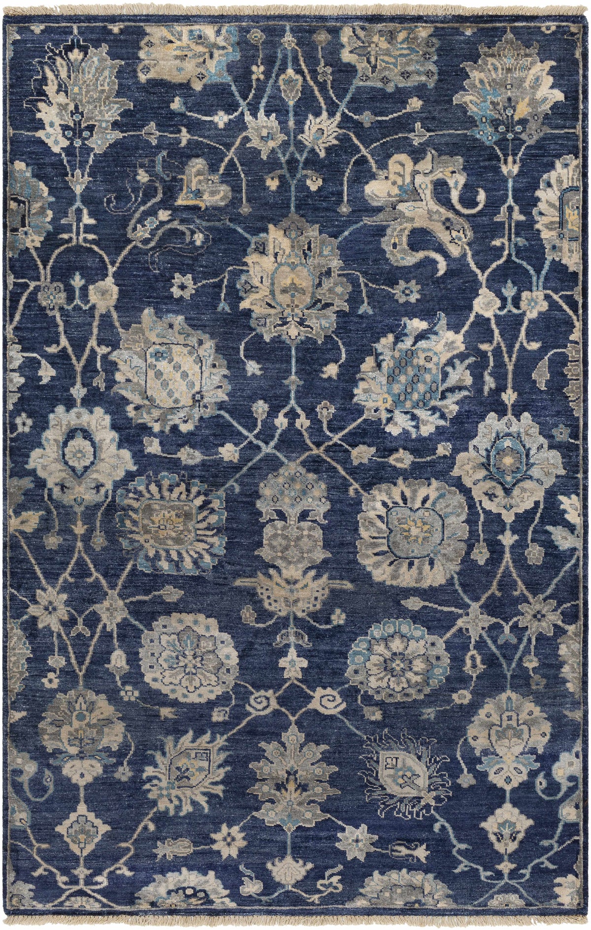 Pinetop Premium Rug by Boutique Rugs in navy with beige floral motifs and fringed edges on Tampa Home & Garden Store