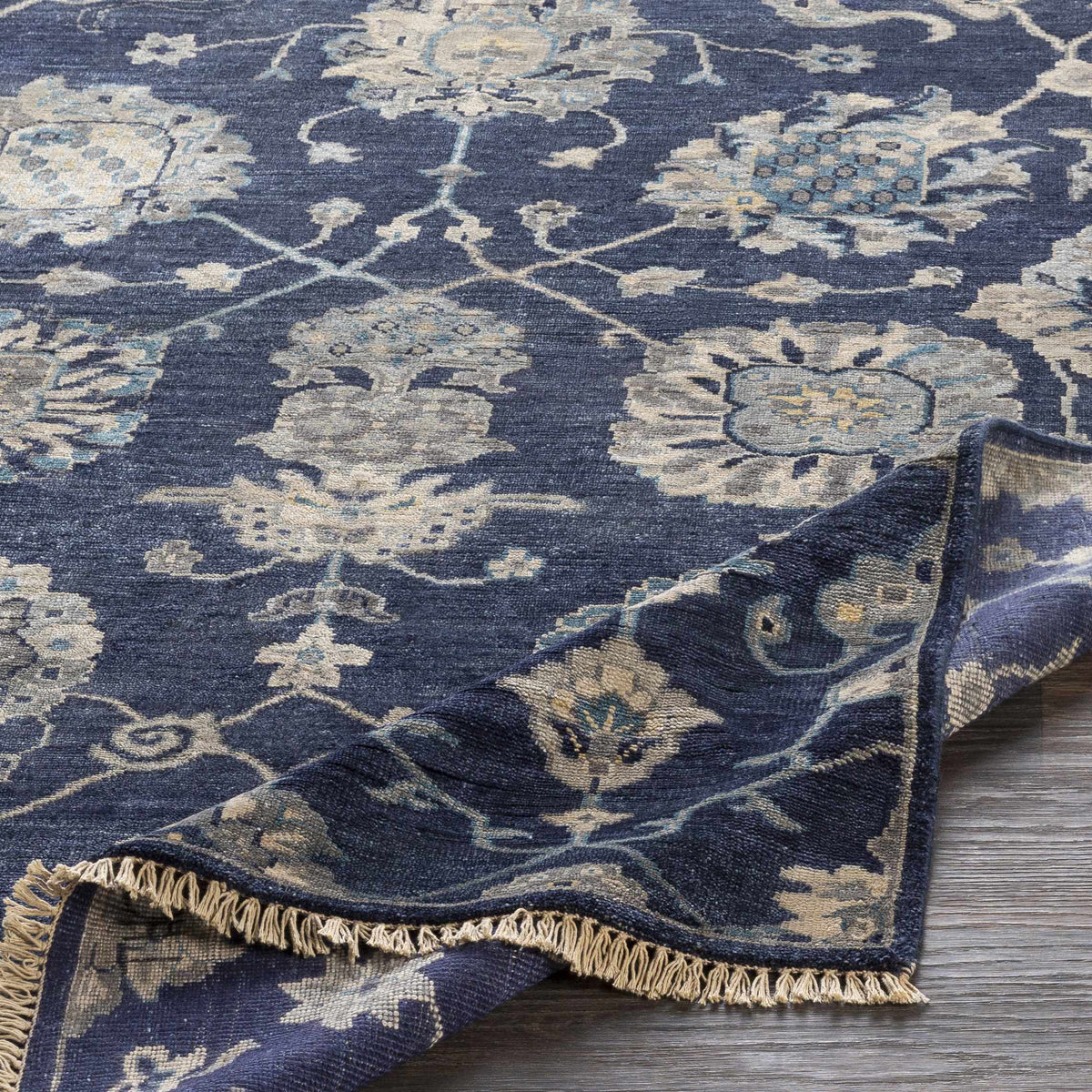 Pinetop Premium Rug navy blue with beige floral pattern and fringe by Boutique Rugs clearance on Tampa Home & Garden Store
