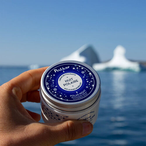 Polaar Revitalizing Night Cream with Boreal Algae jar held in hand; blue lid and starry label on Tampa Home & Garden Store