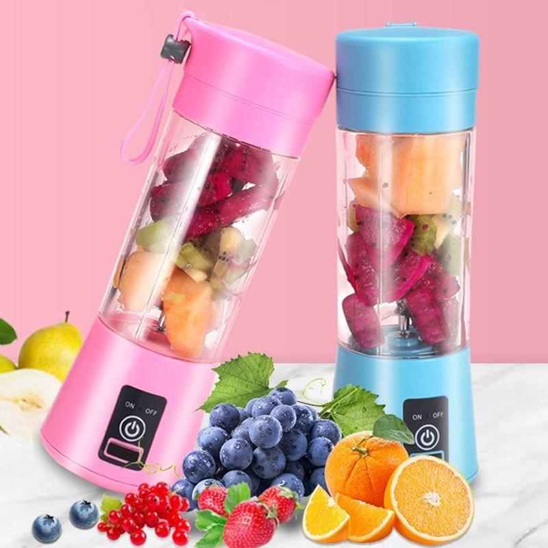 Stevvex portable blender bottle set with pink and blue lids, filled with mixed fruit on Tampa Home & Garden Store