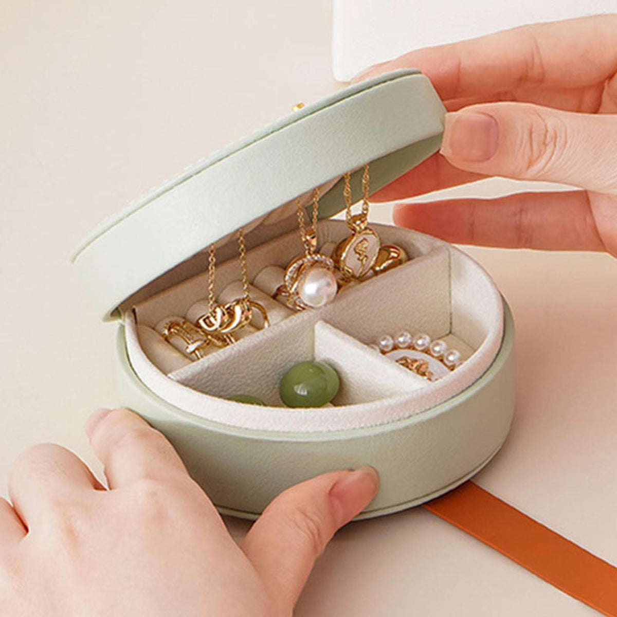 Shaketea mini travel jewelry box with mint exterior and beige interior, gold chains and pearls on Tampa Home & Garden Store