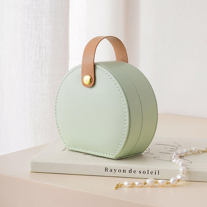 Mini travel jewelry box organizer in mint green with tan leather strap on Tampa Home & Garden Store
