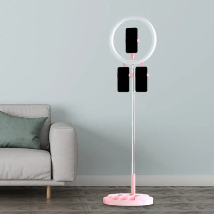 Pink metal ring light with smartphone clamps on a tall stand Decorbites on Tampa Home & Garden Store