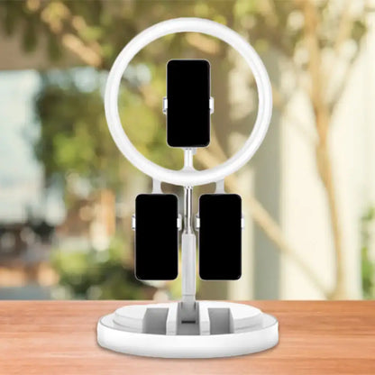 Pink metal ring light with 3 phone mounts on white stand Decorbites on Tampa Home & Garden Store