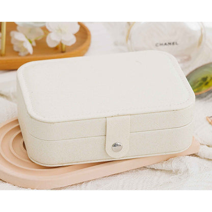 Shaketea portable travel jewelry box beige PU leather with snap closure, Chanel pouch visible on Tampa Home & Garden Store
