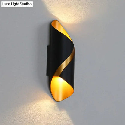 Black spiral wall sconce by Decorbites with gold interior, wall-mounted lighting on Tampa Home & Garden Store