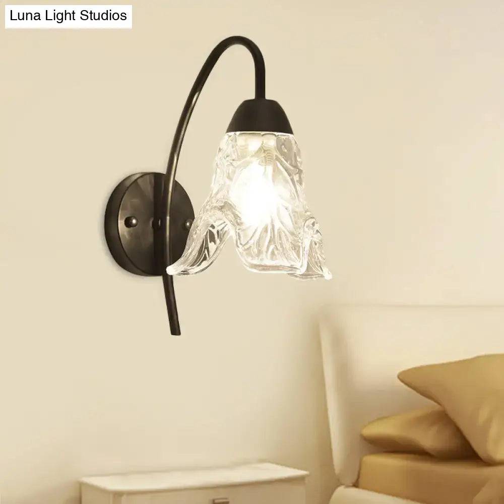 Black crystal drum wall sconce with curved metal arm by Decorbites on Tampa Home & Garden Store