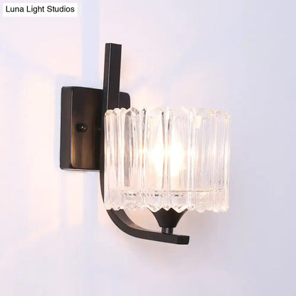 Black crystal drum shape wall sconce with ribbed glass shade by Decorbites on Tampa Home & Garden Store