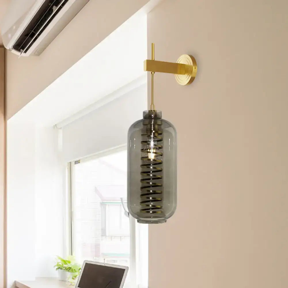 Brass gray glass sconce with spiral filament inside brass wall mount Decorbites on Tampa Home & Garden Store