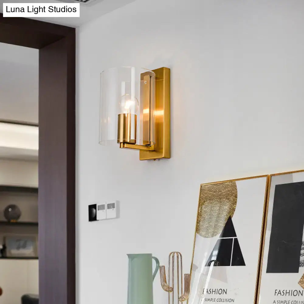 Decorbites brass clear glass sconce wall light with cylindrical shade on Tampa Home & Garden Store