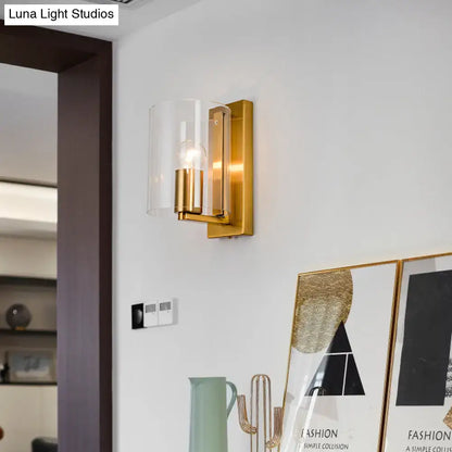 Decorbites brass clear glass sconce wall light with cylindrical shade on Tampa Home & Garden Store