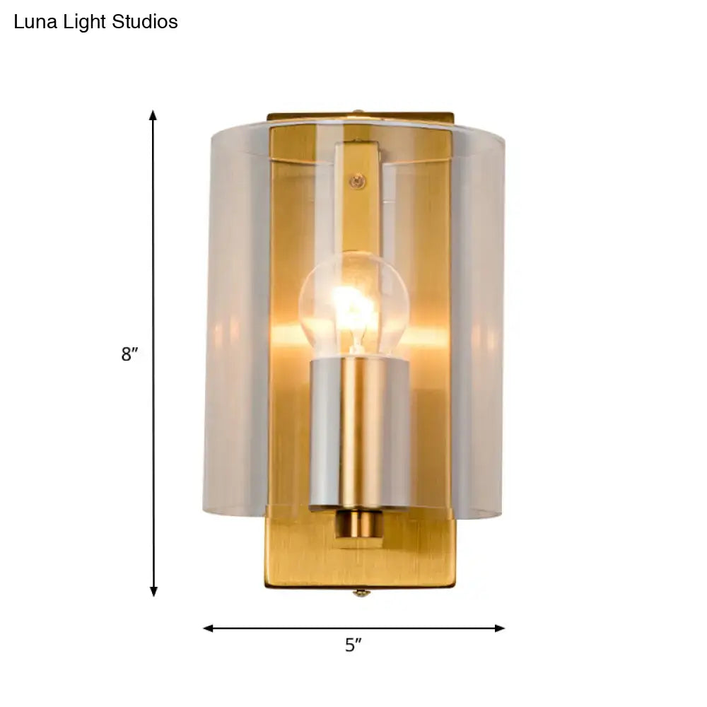 Brass clear glass wall sconce with exposed bulb by Decorbites on Tampa Home & Garden Store
