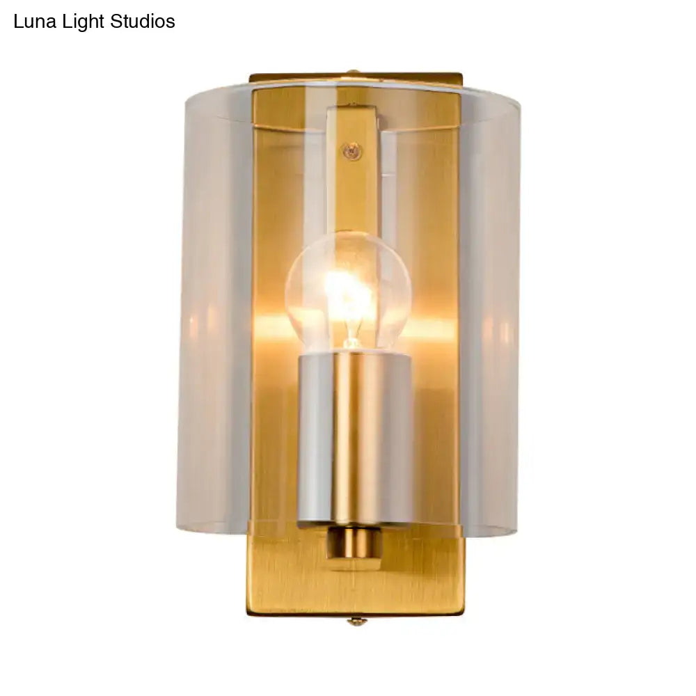 Brass clear glass wall sconce with exposed bulb by Decorbites on Tampa Home & Garden Store