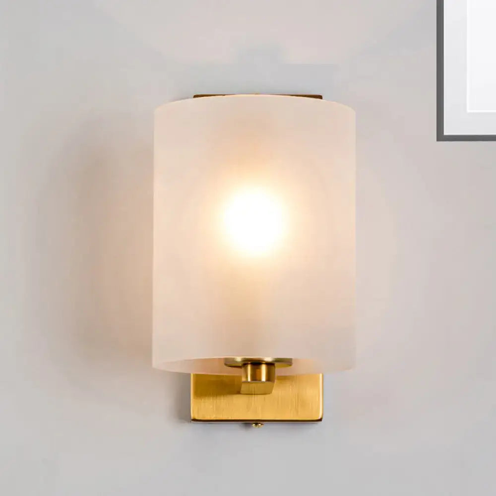 Brass clear glass sconce with cylindrical shade and gold wall plate Decorbites on Tampa Home & Garden Store