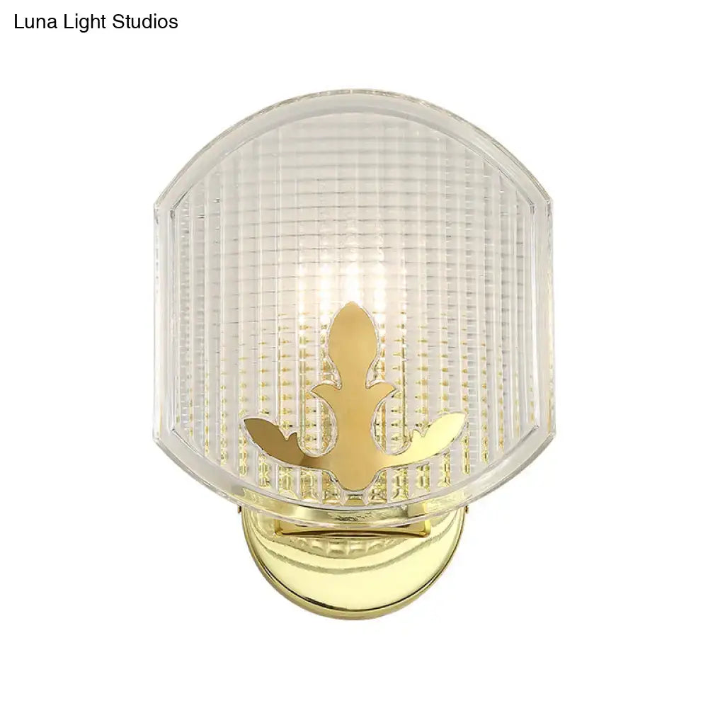 Gold lattice glass wall sconce with brass base and fleur-de-lis accent by Decorbites on Tampa Home & Garden Store