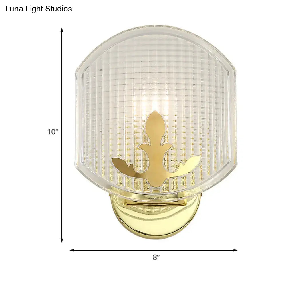 Gold lattice glass wall sconce by Decorbites with ribbed shade and fleur-de-lis accent on Tampa Home & Garden Store