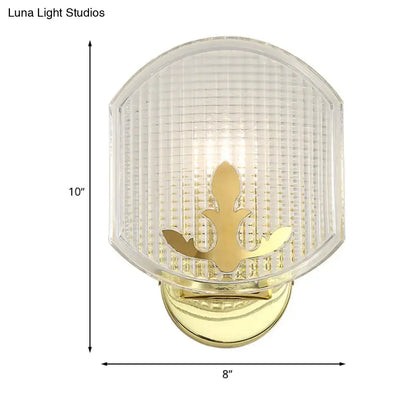 Gold lattice glass wall sconce by Decorbites with ribbed shade and fleur-de-lis accent on Tampa Home & Garden Store