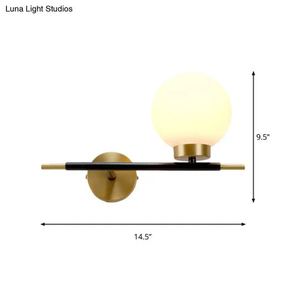 Decorbites White Brass Sphere Sconce wall light with frosted globe and black bar on Tampa Home & Garden Store