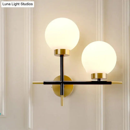White Brass Sphere Sconce by Decorbites, double-globe wall light with frosted glass globes on Tampa Home & Garden Store
