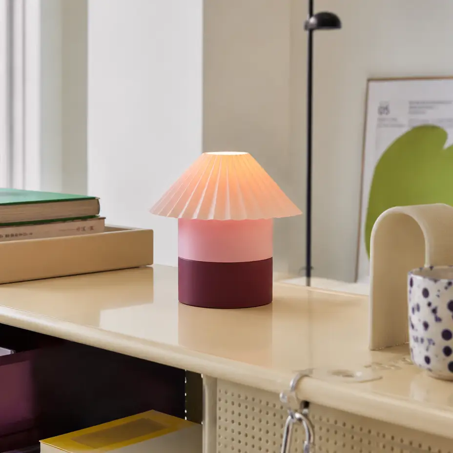 Cici Lamp small color block table lamp with pink pleated shade and purple base on a cream desk on Tampa Home & Garden Store