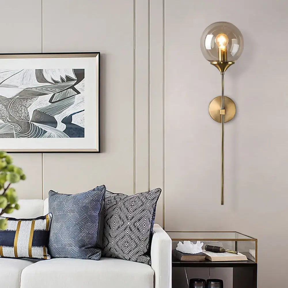 Amber Smoke Glass Wall Sconce by Decorbites, brass wall mount with glass globe shade on Tampa Home & Garden Store