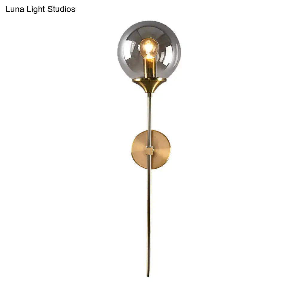 Amber Smoke Glass Wall Sconce with brass finish wall mount and clear globe bulb Decorbites on Tampa Home & Garden Store
