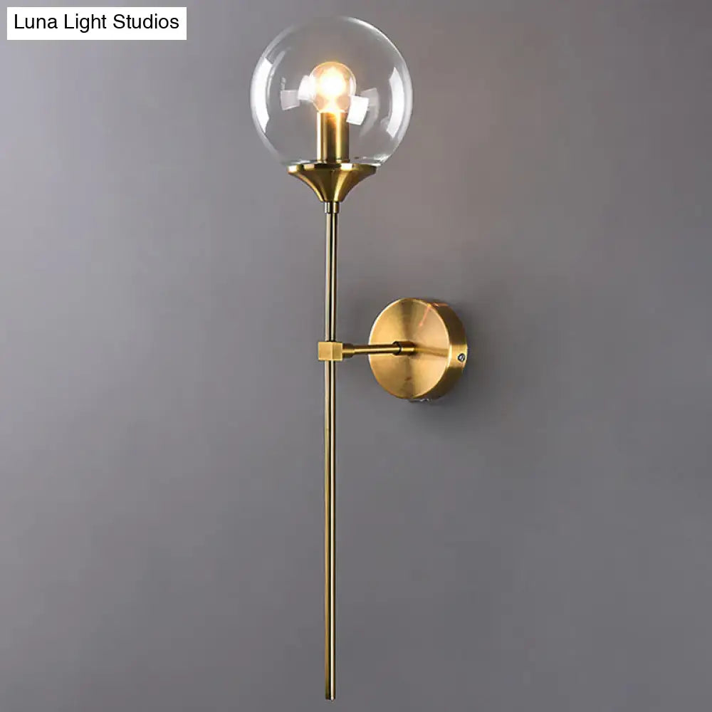 Amber Smoke Glass Wall Sconce with brass finish and clear globe bulb Decorbites on Tampa Home & Garden Store